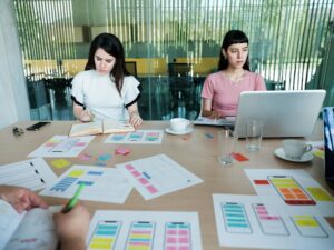 Diligent young latin women working together